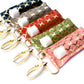 Gold Quatrefoil on Cranberry LippyClip® Lip Balm Holder